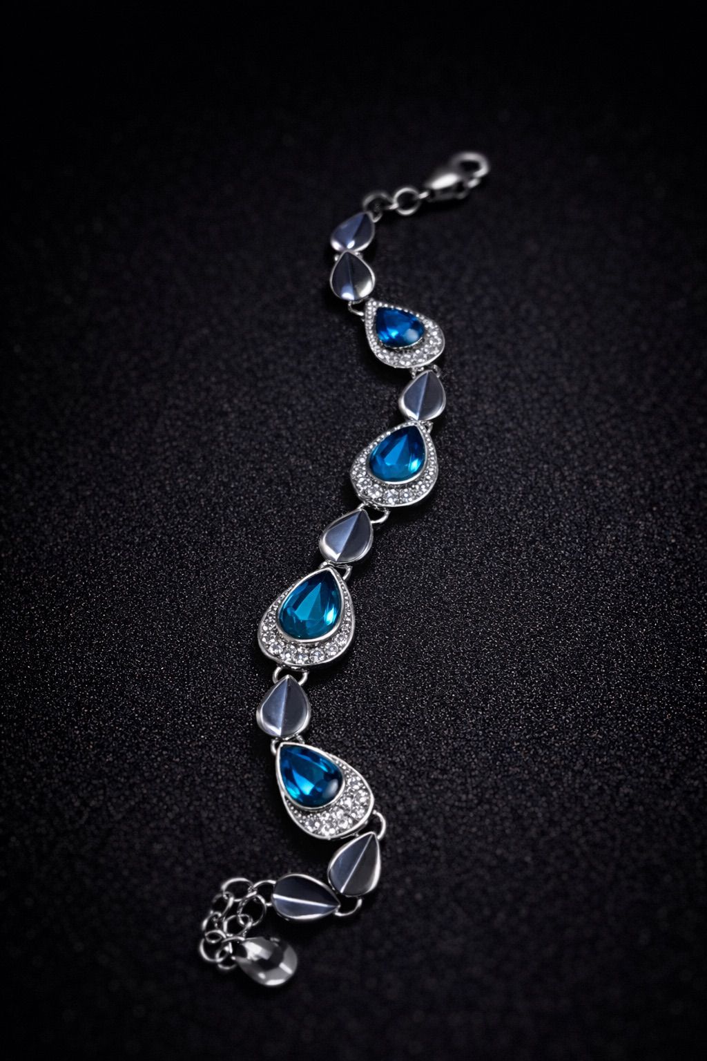 Ocean Blue Pear-Cut Gemstone Bracelet – Shimmering Halo Teardrop Link Wristlet – Sophisticated Formal Statement Jewelry