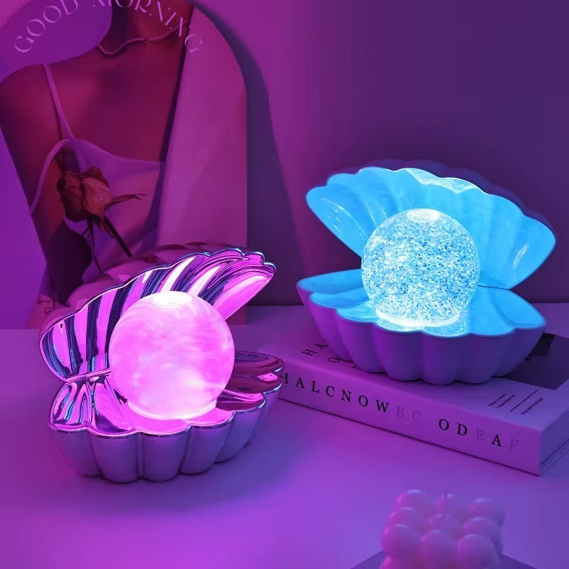 A beautiful shell pearl night lamp that adds soft light and luxury vibes to your room.