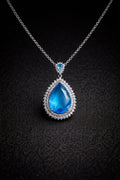 Brilliant Blue Pear-Cut Statement Necklace – Double Halo Crystal Teardrop Pendant – Exquisite Gala & Wedding Jewelry