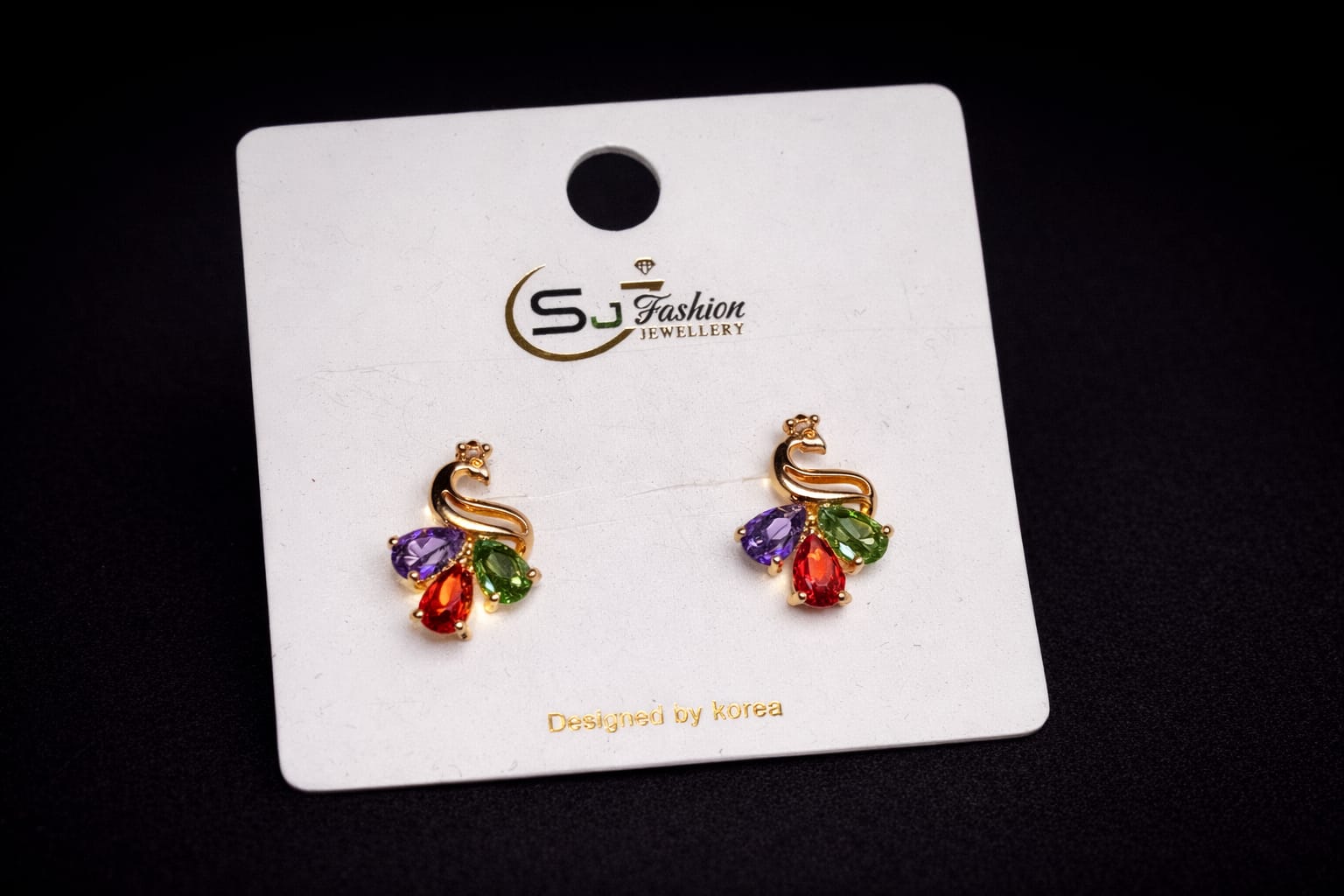 Golden Peacock Prism Studs: Bold & Colorful Gemstone Earrings for a Touch of Royal Elegance!.