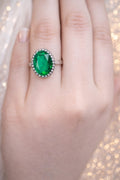 Emerald Enchantment Halo Ring: A Bold & Majestic Statement in Brilliant Green!